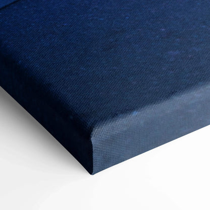 Close-up of dark blue textured canvas edge, showcasing premium museum-quality wall art material.