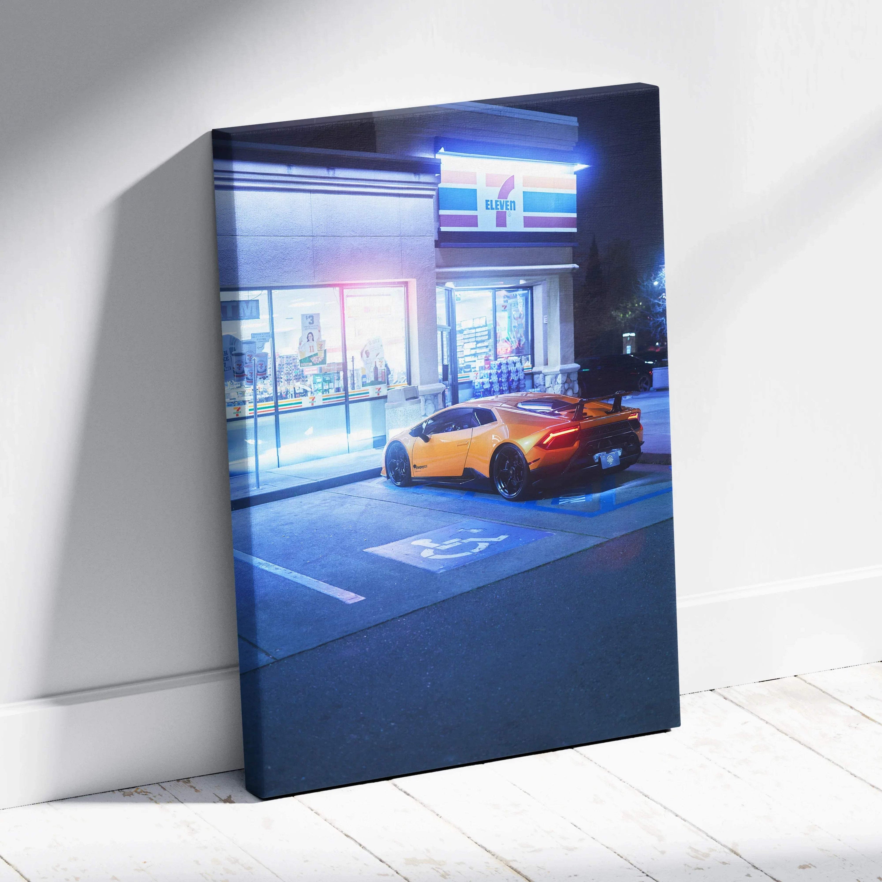 Lamborghini Huracan parked outside lit building at night vertical canvas wall art.