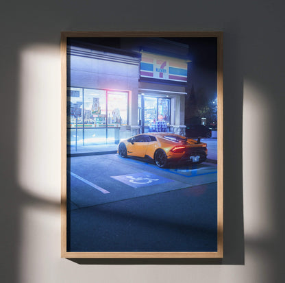 Lamborghini Huracan parked outside convenience store at night poster wall art in wooden frame.