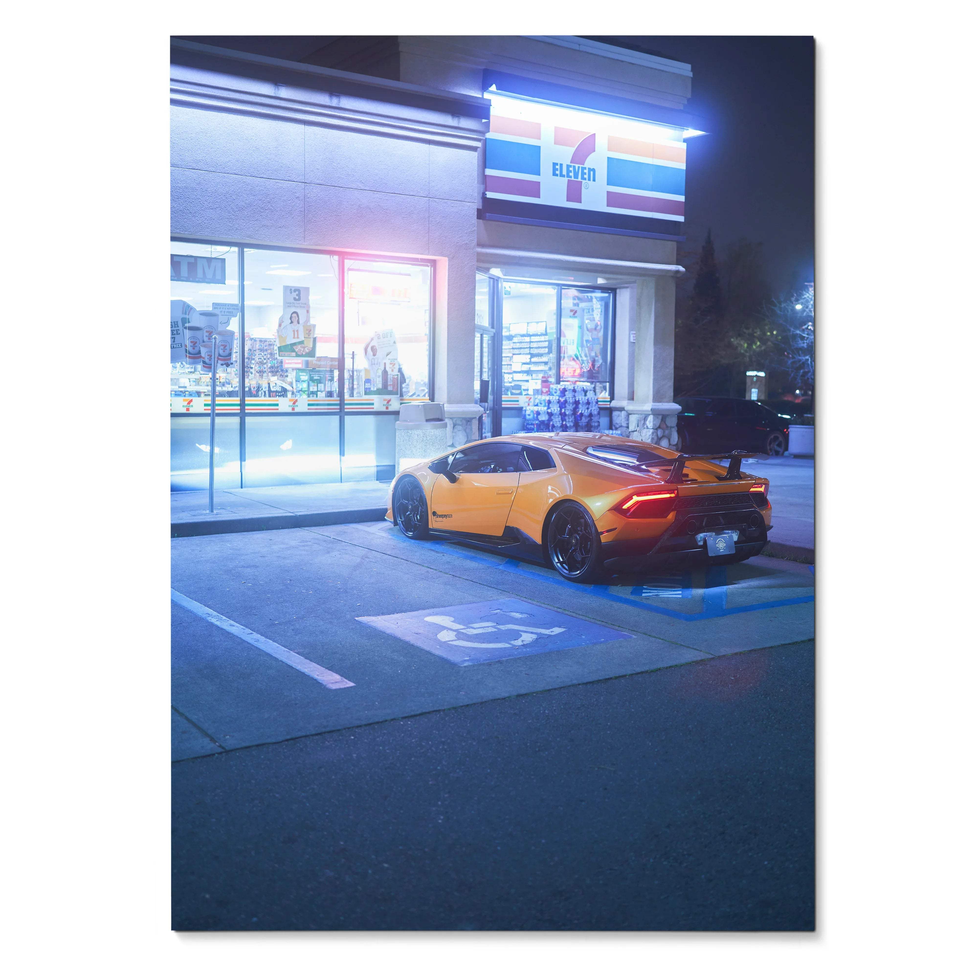Lamborghini Huracan parked outside illuminated 7-Eleven at night poster wall art.