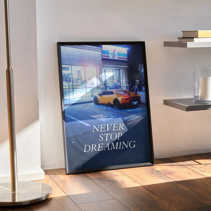 Motivational wall art poster featuring a yellow Lamborghini Huracan with "Never Stop Dreaming" text in black frame.