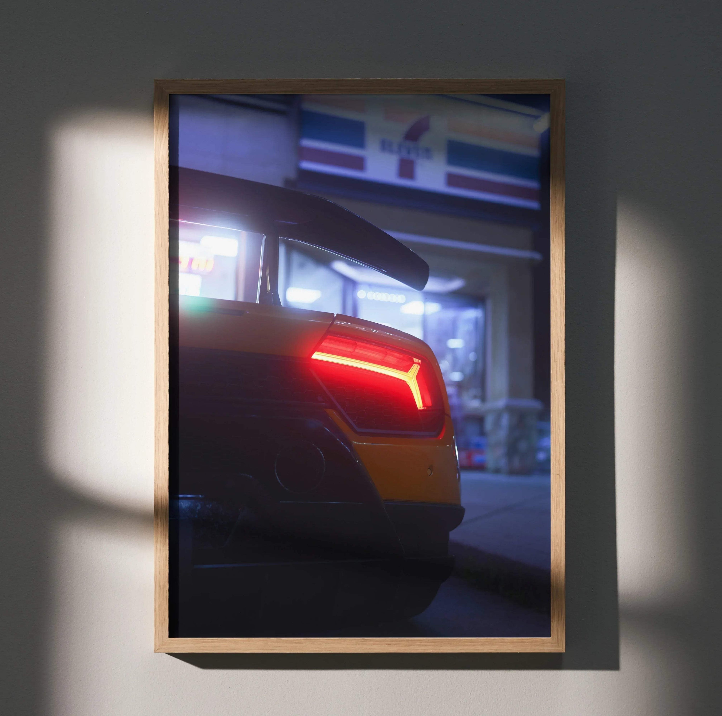 Lamborghini Huracan rear view with illuminated taillight poster wall art in wooden frame.