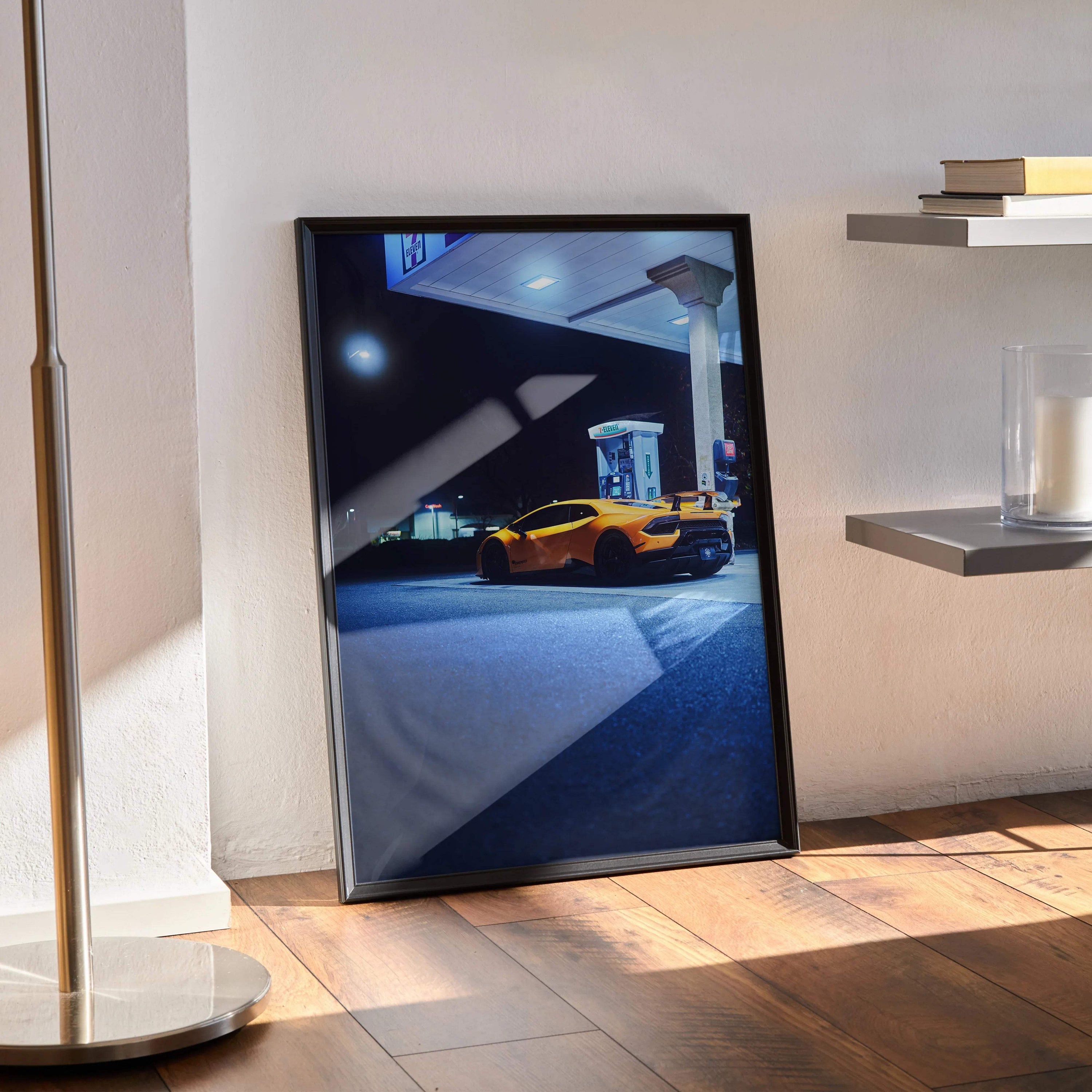 Lamborghini Huracan poster wall art with vibrant night street scene in black frame.