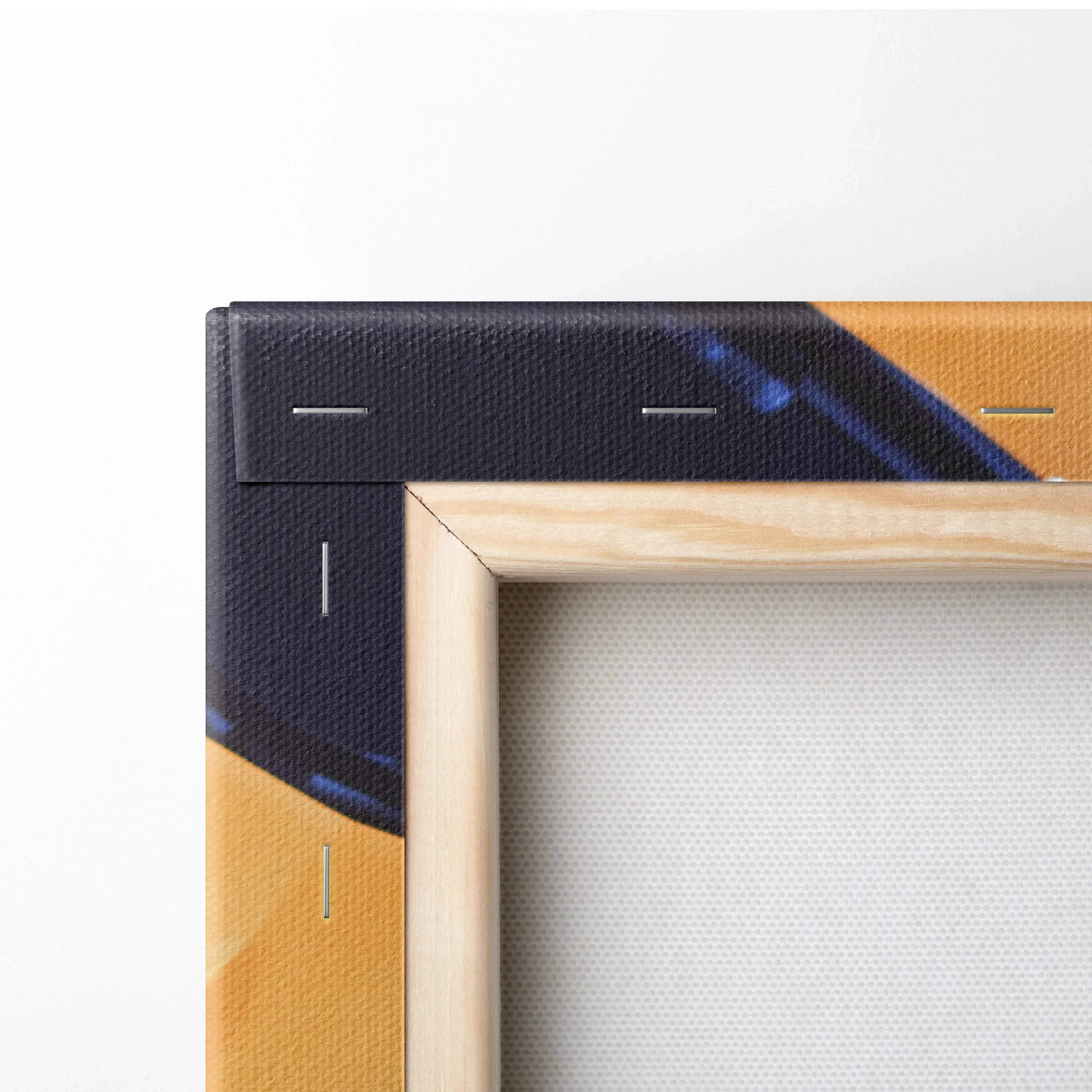 Close-up of wooden-framed canvas wall art with black and orange automotive design edges.