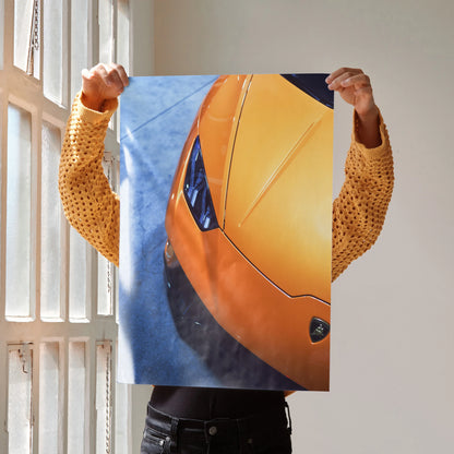 Lamborghini Huracan close-up poster featuring vibrant orange sports car front in high-resolution wall art.