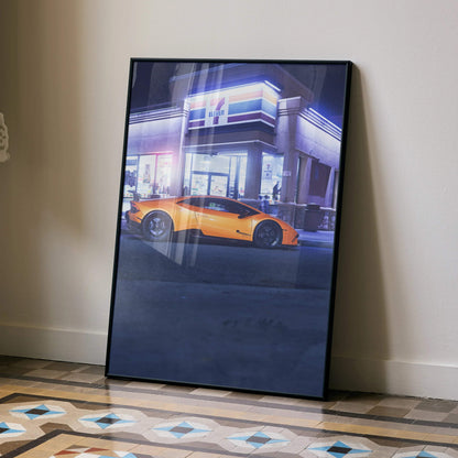 Lamborghini Huracan orange sports car poster leaning against wall modern building background wall art.