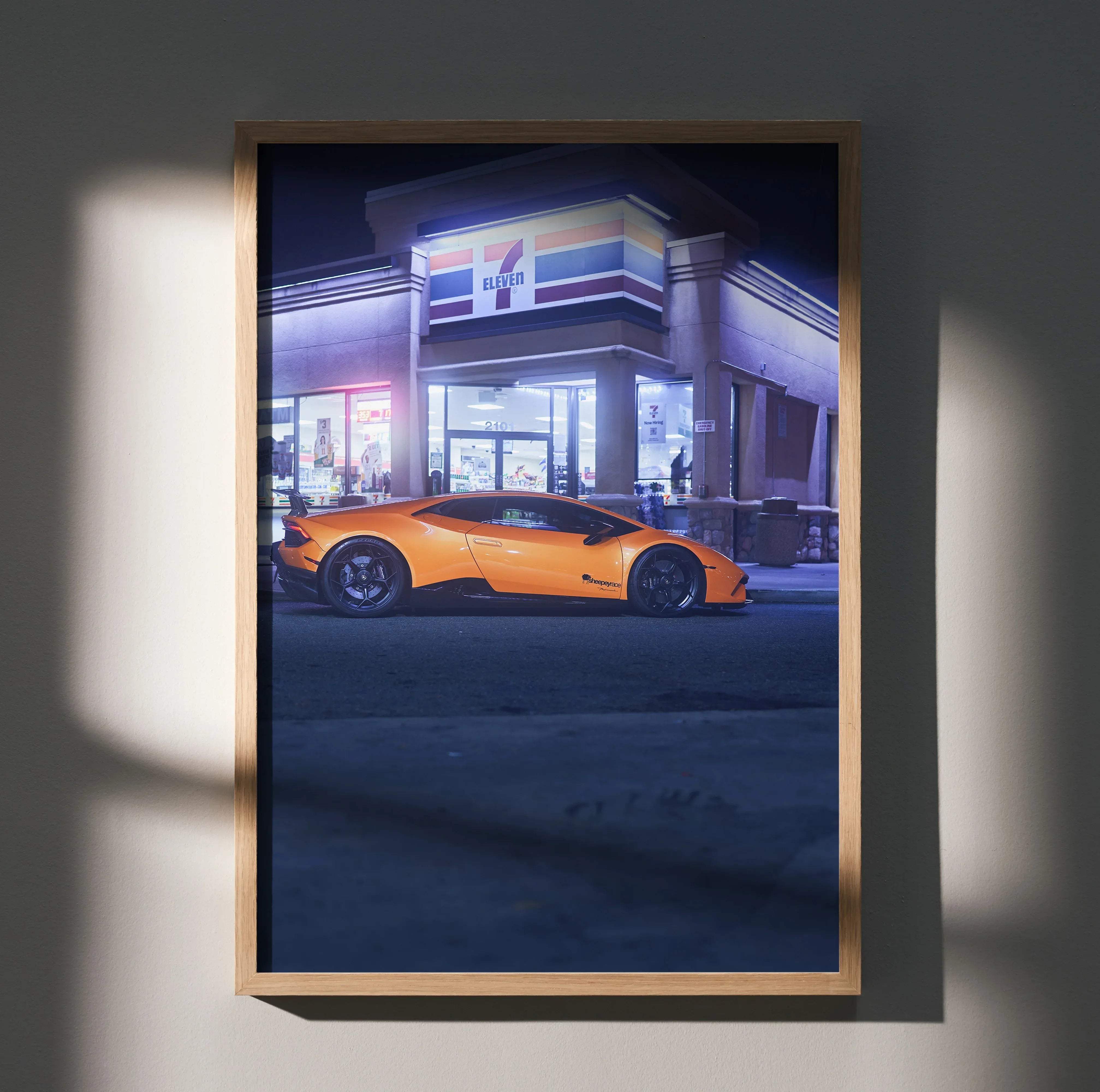 Orange Lamborghini Huracan sports car wall art in a light wood frame high resolution automotive masterpiece