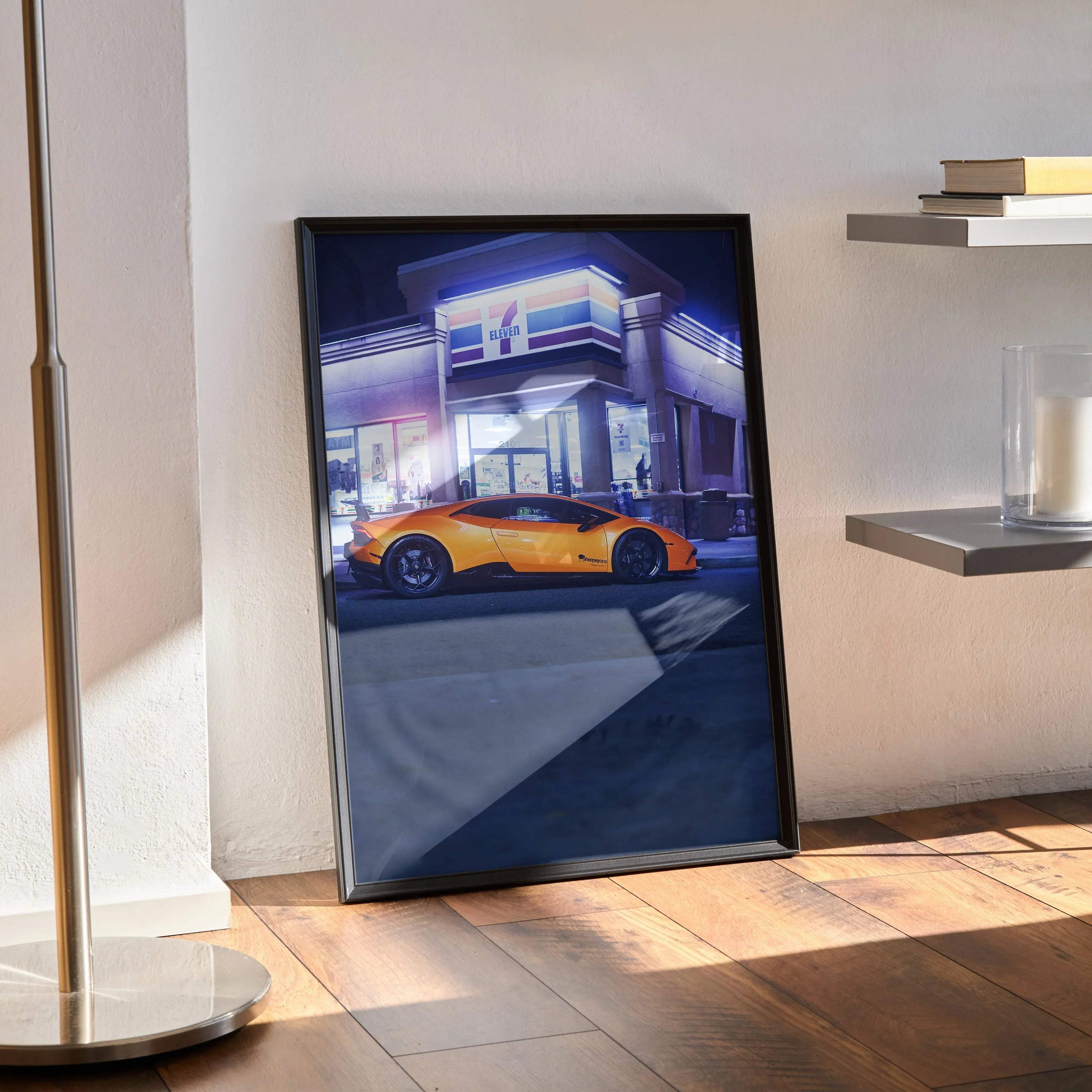 Orange Lamborghini Huracan poster with modern building background, sleek wall art in black frame.