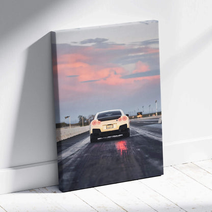 Nissan R35 GTR driving on wet road at sunset vertical canvas art wall decor.
