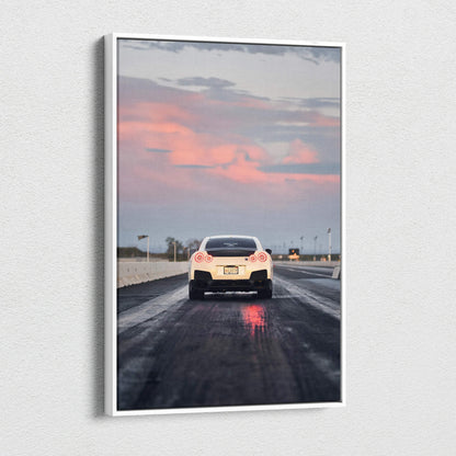 Nissan R35 GTR on wet road under pink sunset sky vertical canvas wall art.