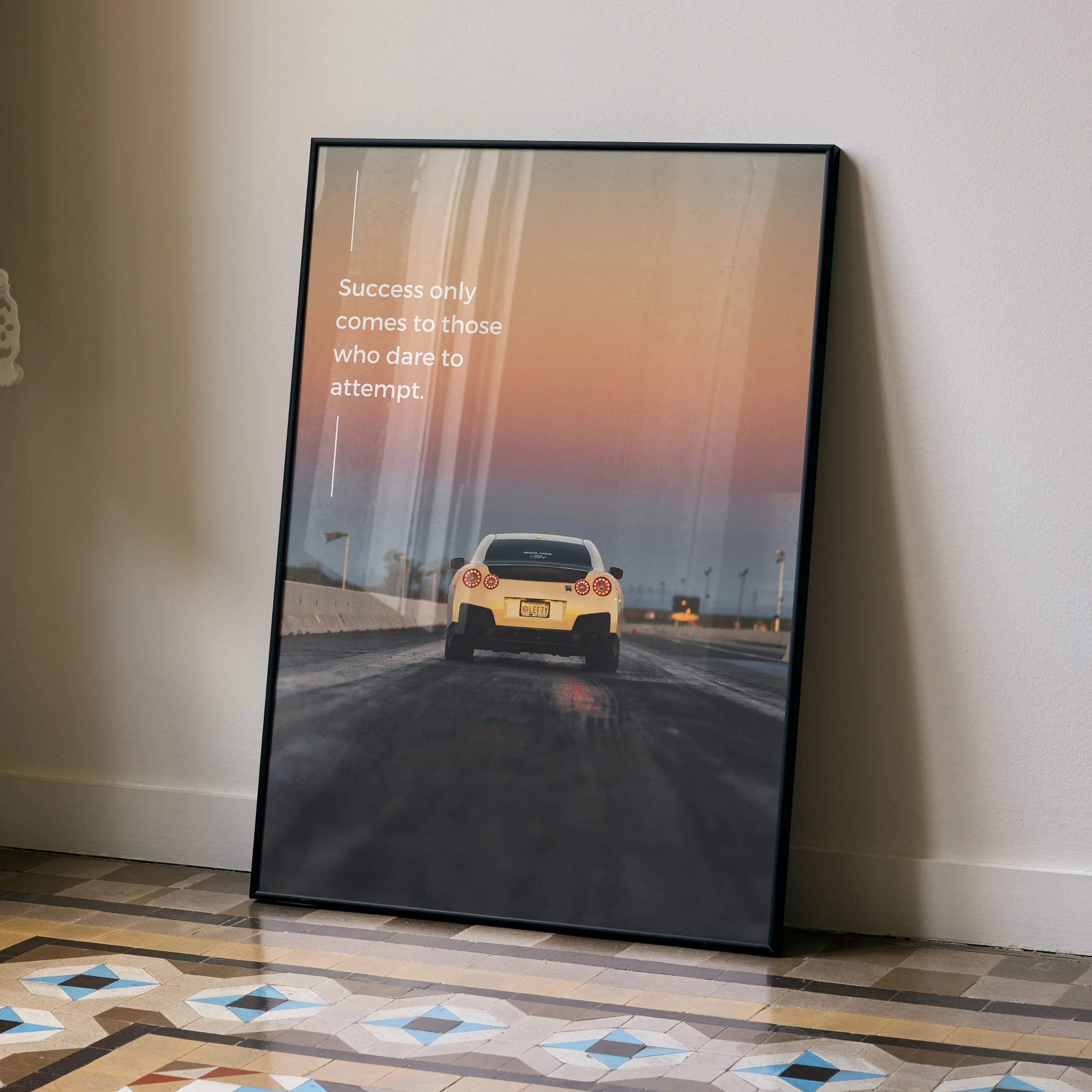 Motivational poster wall art featuring rear view of yellow Nissan R35 GT-R on sunset road.
