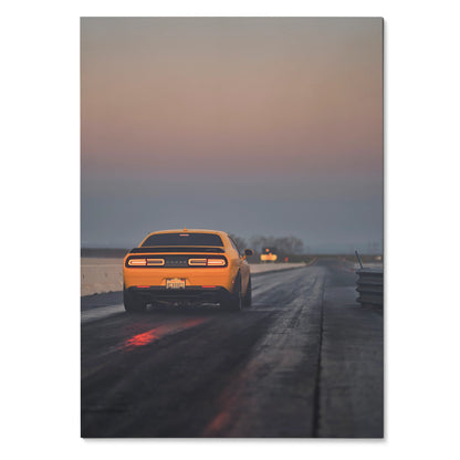 Dodge Challenger poster showing rear view on wet road at dusk, automotive wall art with moody lighting.