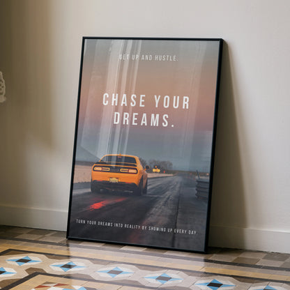 Motivational poster wall art featuring a yellow Dodge Challenger on a road with "Chase Your Dreams" text.