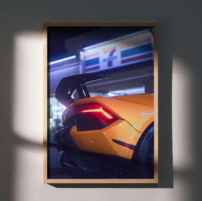 Yellow Lamborghini Huracan rear with illuminated taillights at night, poster wall art.
