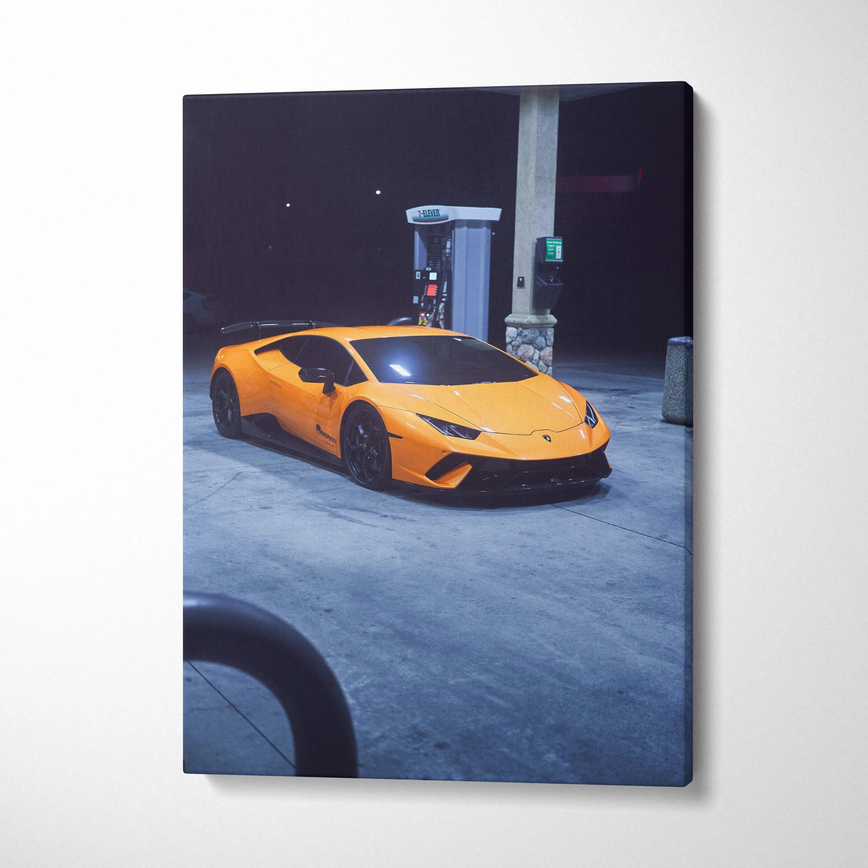 Lamborghini Huracan parked at gas station canvas wall art in vertical museum-quality print.