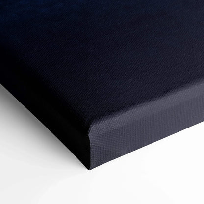 Black textured canvas edge close-up showcasing high-quality wall art material and craftsmanship.
