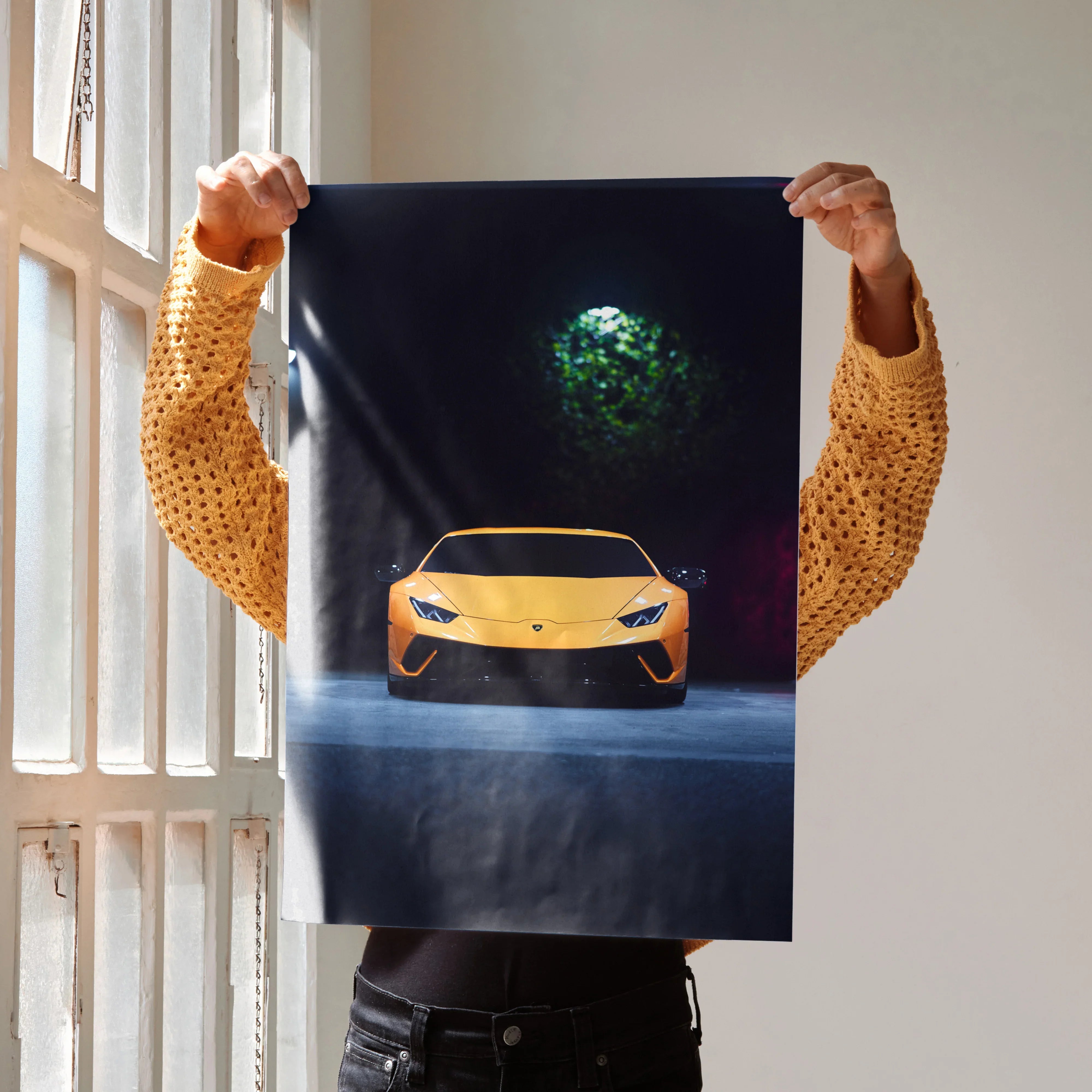 Lamborghini Huracan yellow supercar poster with dramatic lighting, sleek front view wall art.