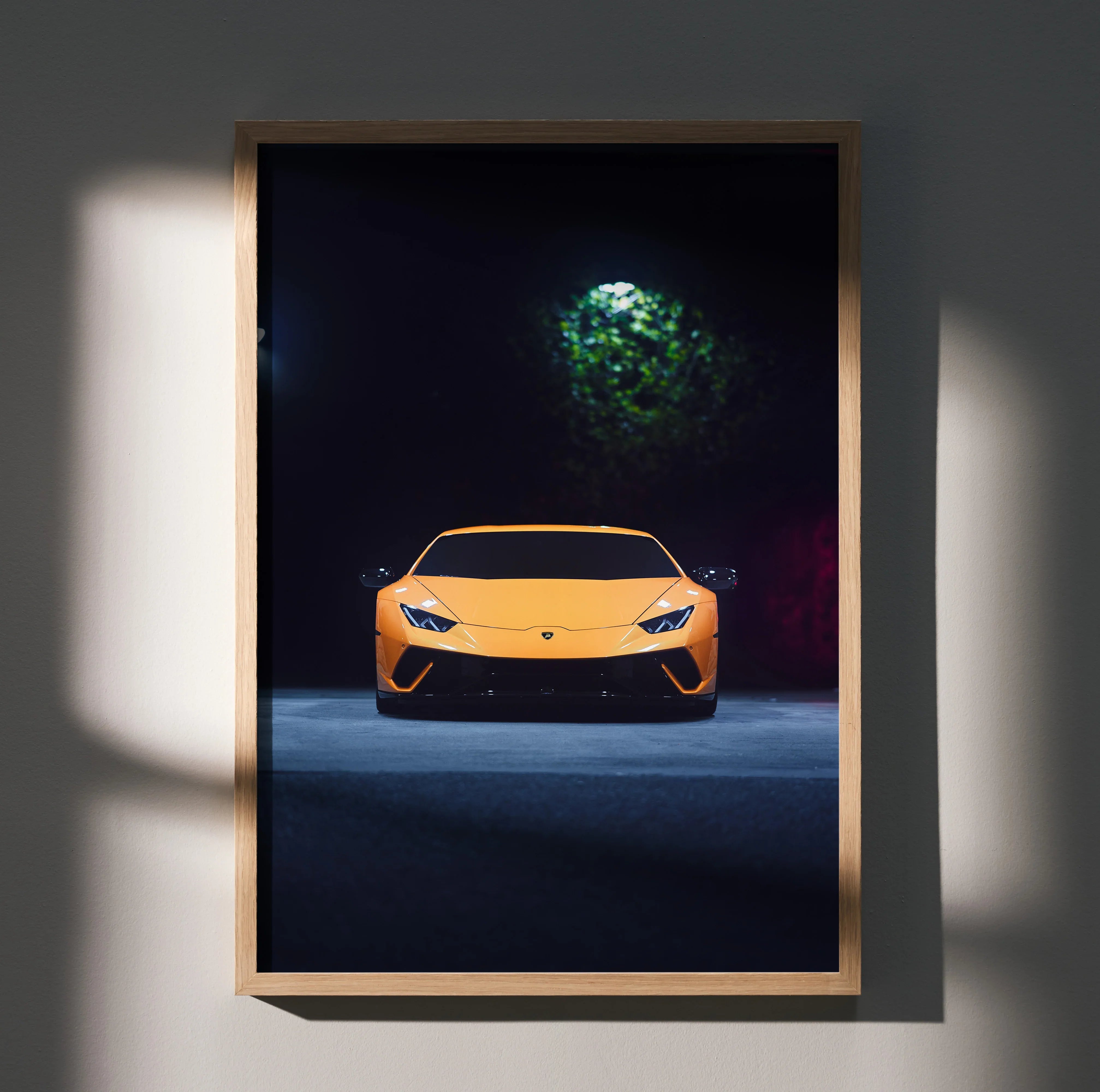 Lamborghini Huracan in yellow at night with glowing headlights poster wall art.
