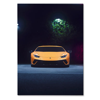 Yellow Lamborghini Huracan front view at night poster wall art with dramatic lighting.