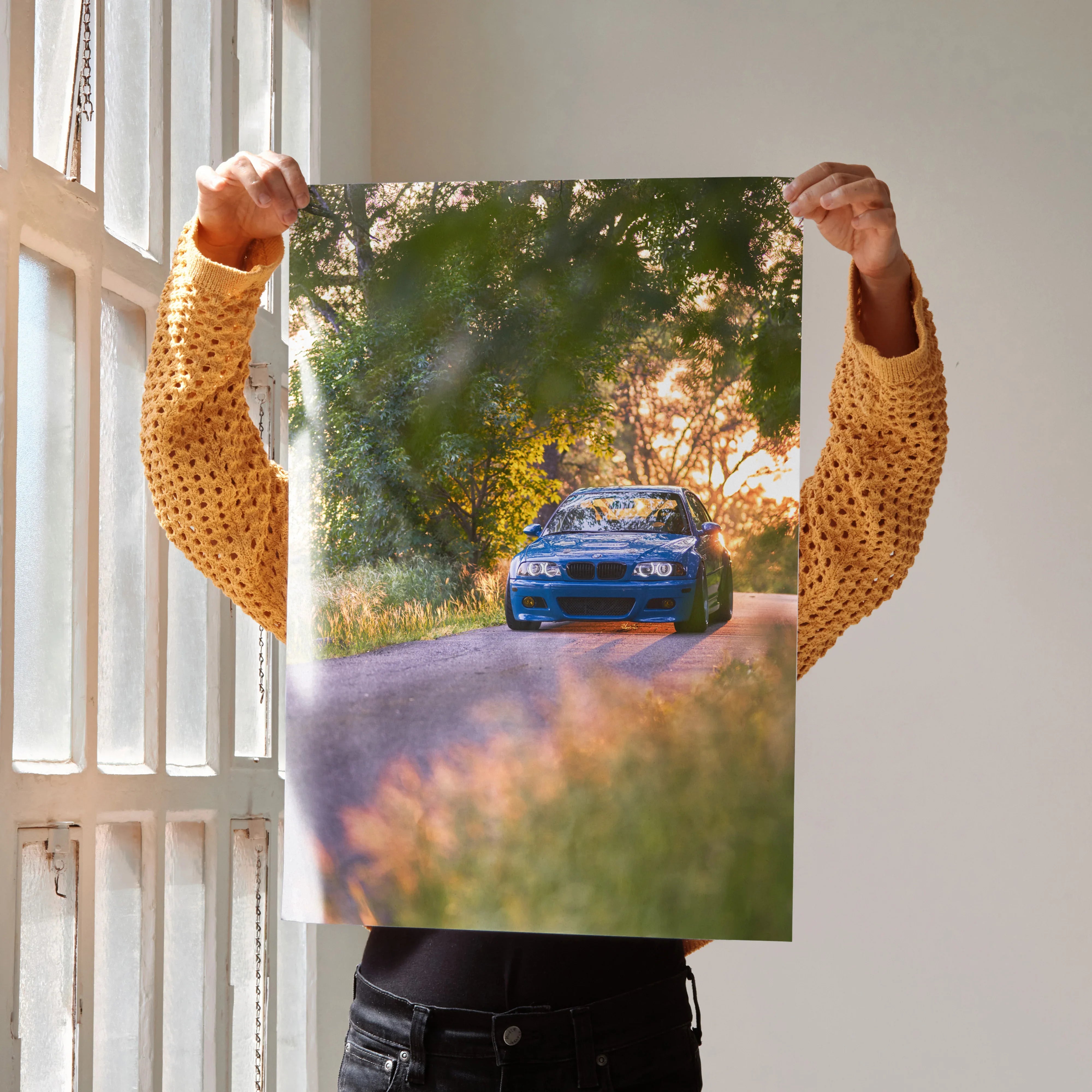 BMW E46 M3 driving on scenic road with trees sunset poster wall art.