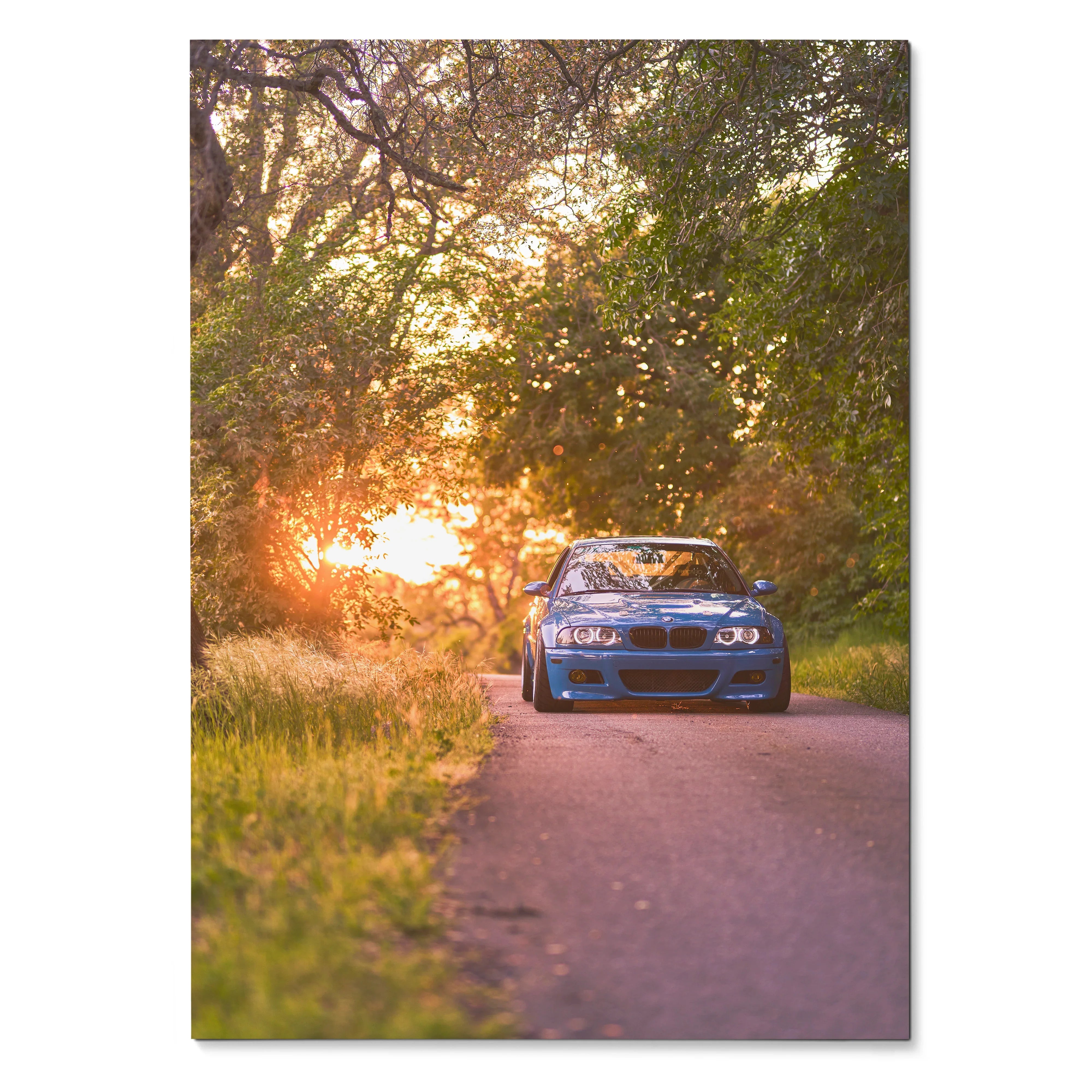 BMW E46 M3 in blue on country road at sunset automotive wall art poster.