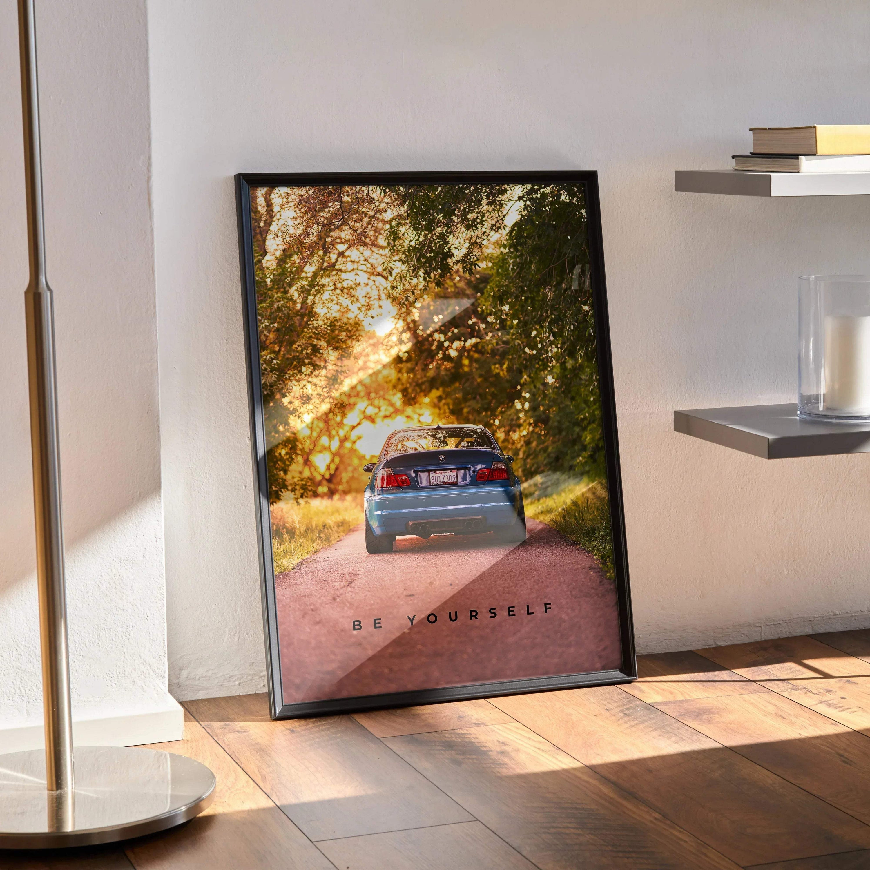 BMW E46 M3 motivational poster wall art featuring car on scenic road with inspiring text.