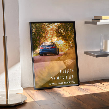 BMW E46 M3 poster wall art with autumn road scene and motivational text in black frame.