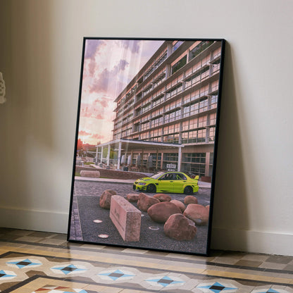 Mitsubishi Evo 9 in bright lime green parked by modern building at sunset poster wall art.