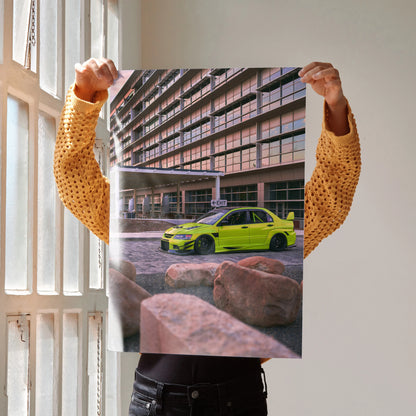 Mitsubishi Evo 9 in bright green parked in urban setting poster wall art.
