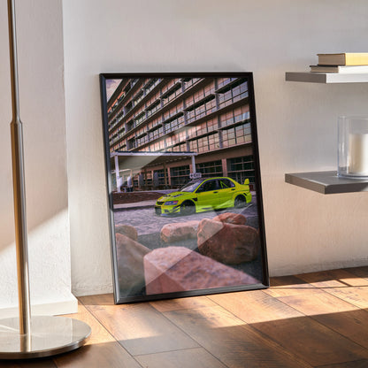 Mitsubishi Evo 9 in bright green parked under urban building, framed poster wall art in modern room.