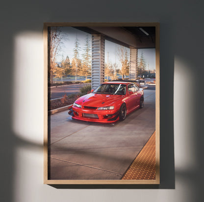 Red Nissan 240sx S14 Kouki poster with urban parking backdrop, automotive wall art.