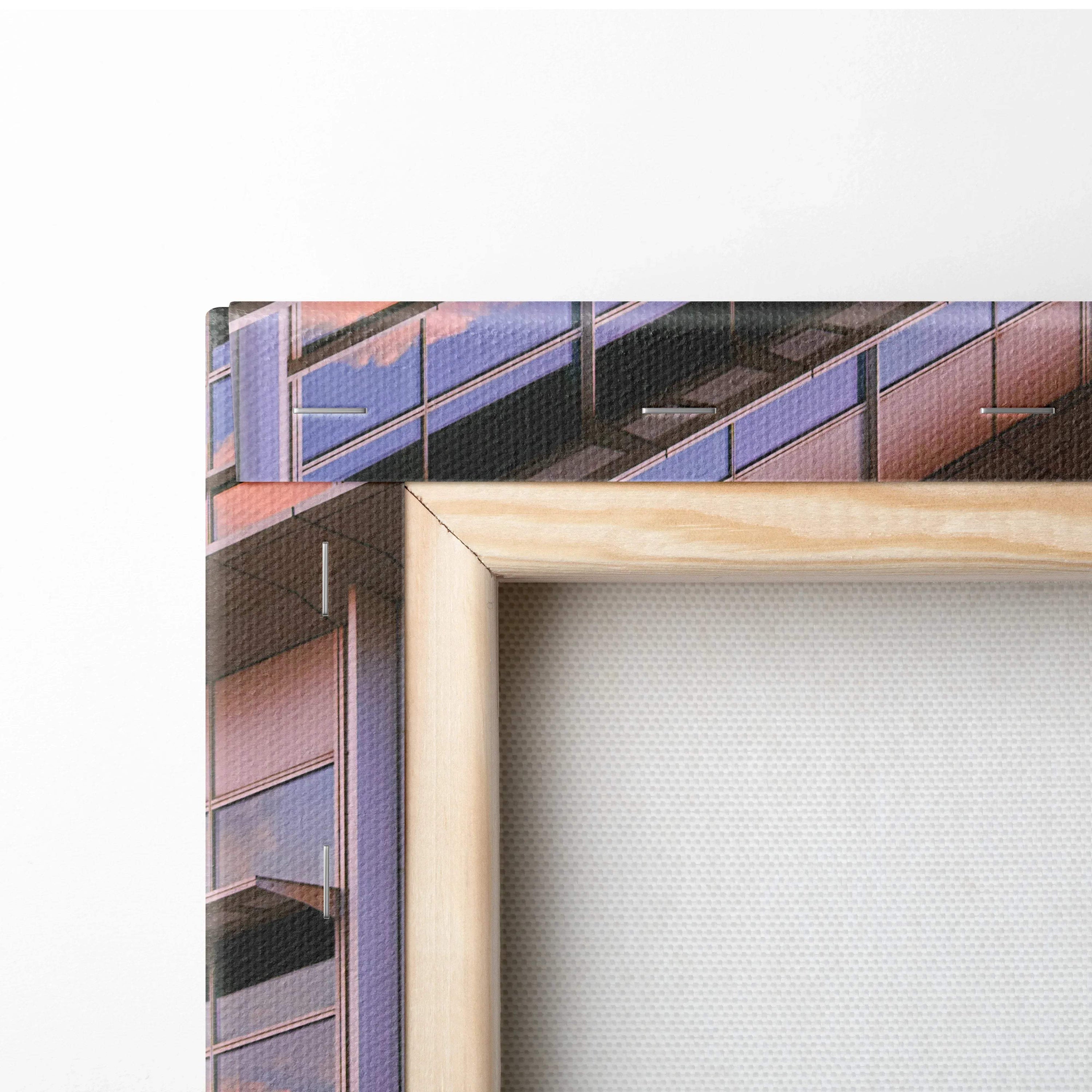 Natural wood frame corner with stretched white canvas backing for vertical wall art canvas print.