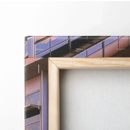 Natural wood frame corner with stretched white canvas backing for vertical wall art canvas print.