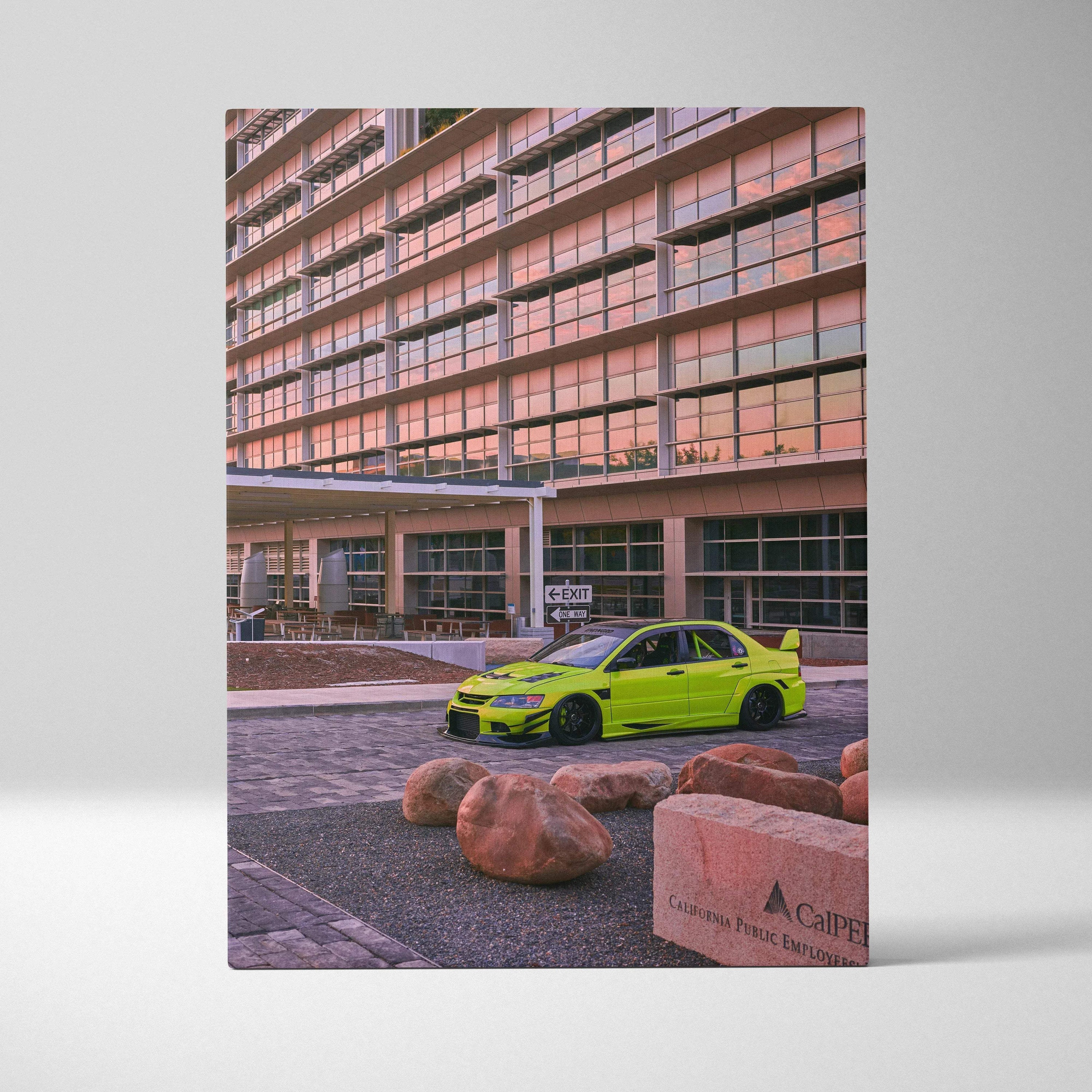 Mitsubishi Evo 9 bright green car parked in front of modern building canvas wall art.