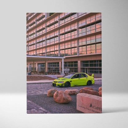Mitsubishi Evo 9 bright green car parked in front of modern building canvas wall art.