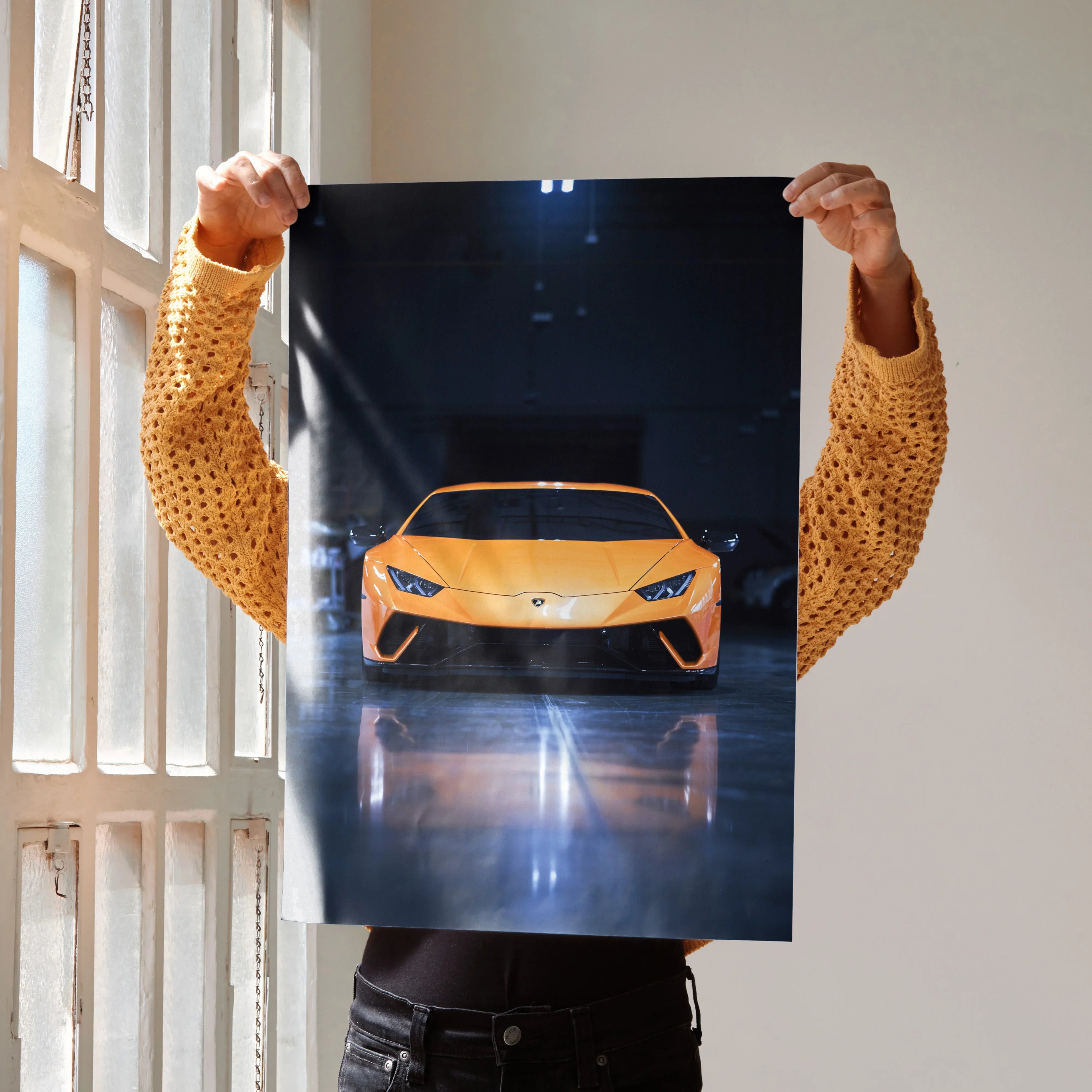 Lamborghini Huracan in bright orange displayed on sleek black background poster wall art.