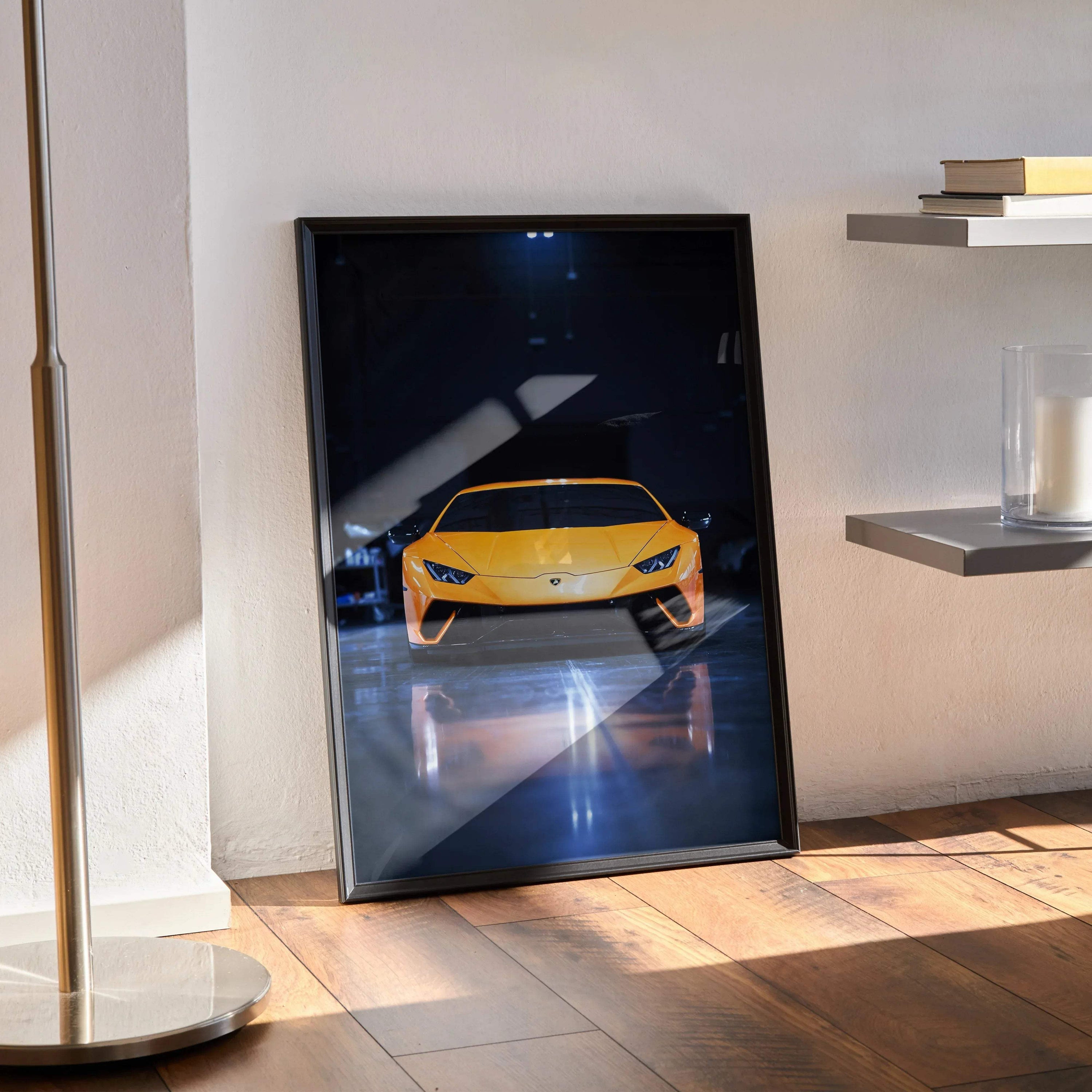 Lamborghini Huracan front view in bright yellow on glossy black poster wall art in black frame.
