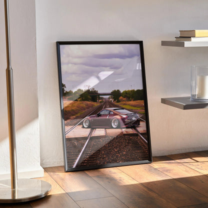 Nissan 350Z poster with sleek car on railroad tracks under cloudy sky, framed wall art in modern room.