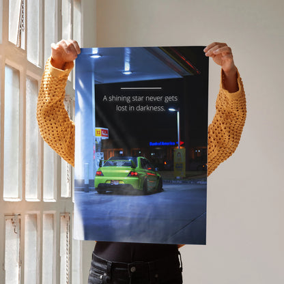 Motivational poster wall art featuring a green Mitsubishi Evo 9 with inspiring text on a nighttime street backdrop.
