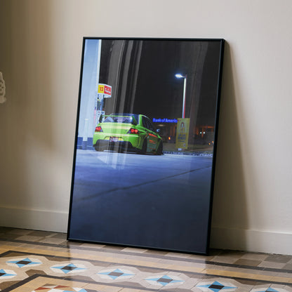 Mitsubishi Evo 9 in neon green at night under streetlight poster wall art with black frame.