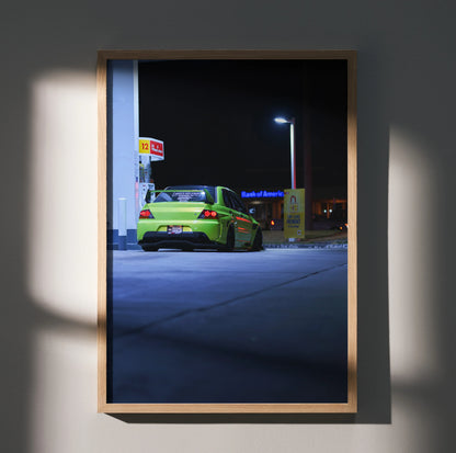Mitsubishi Evo 9 JDM poster showing rear view of green car at night under streetlight wall art.