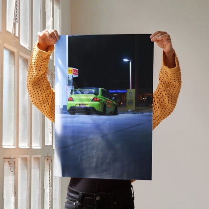 Poster wall art featuring a green Mitsubishi Evo 9 in a nighttime urban setting under streetlights.