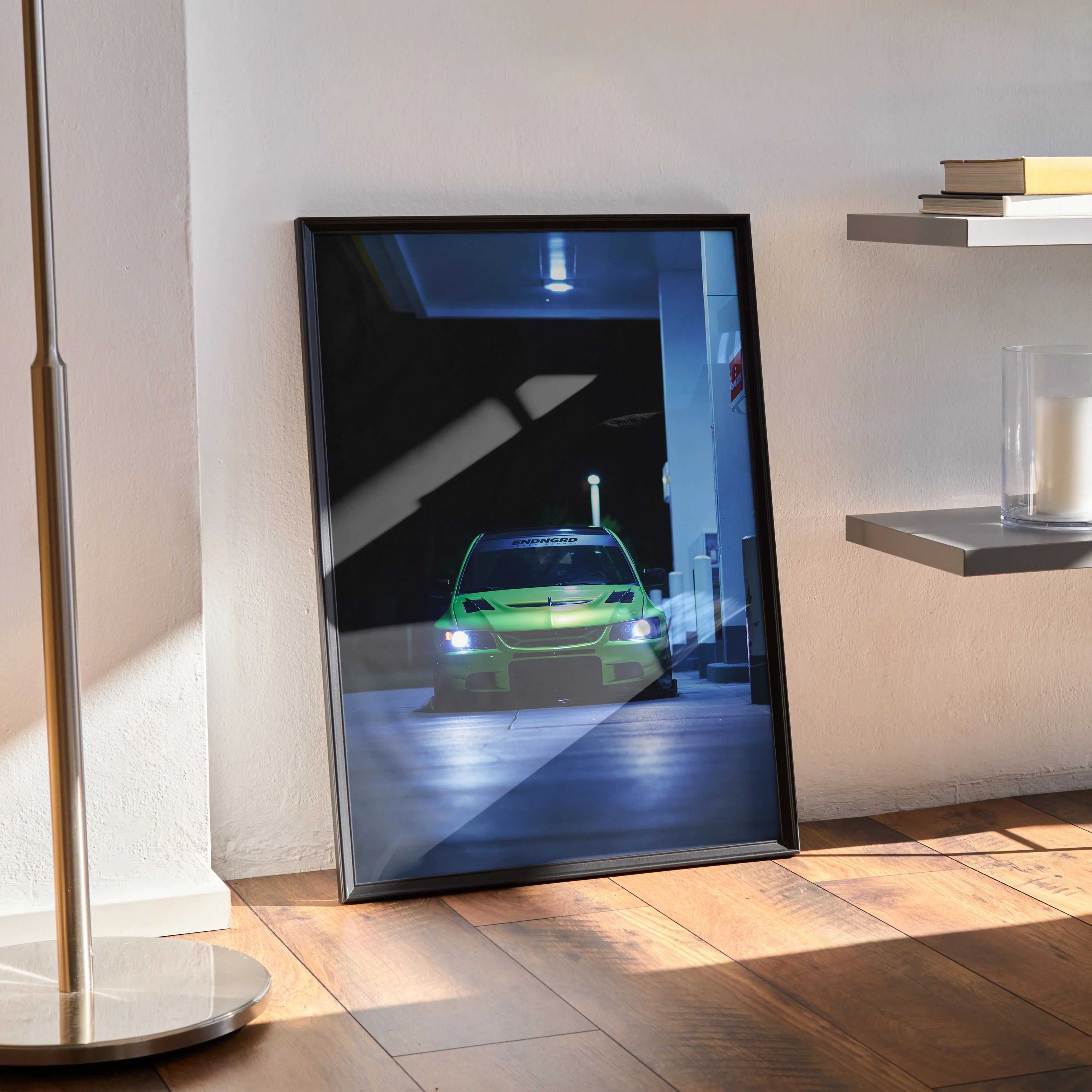 Mitsubishi Evo 9 glowing green in dark garage poster wall art in black frame.