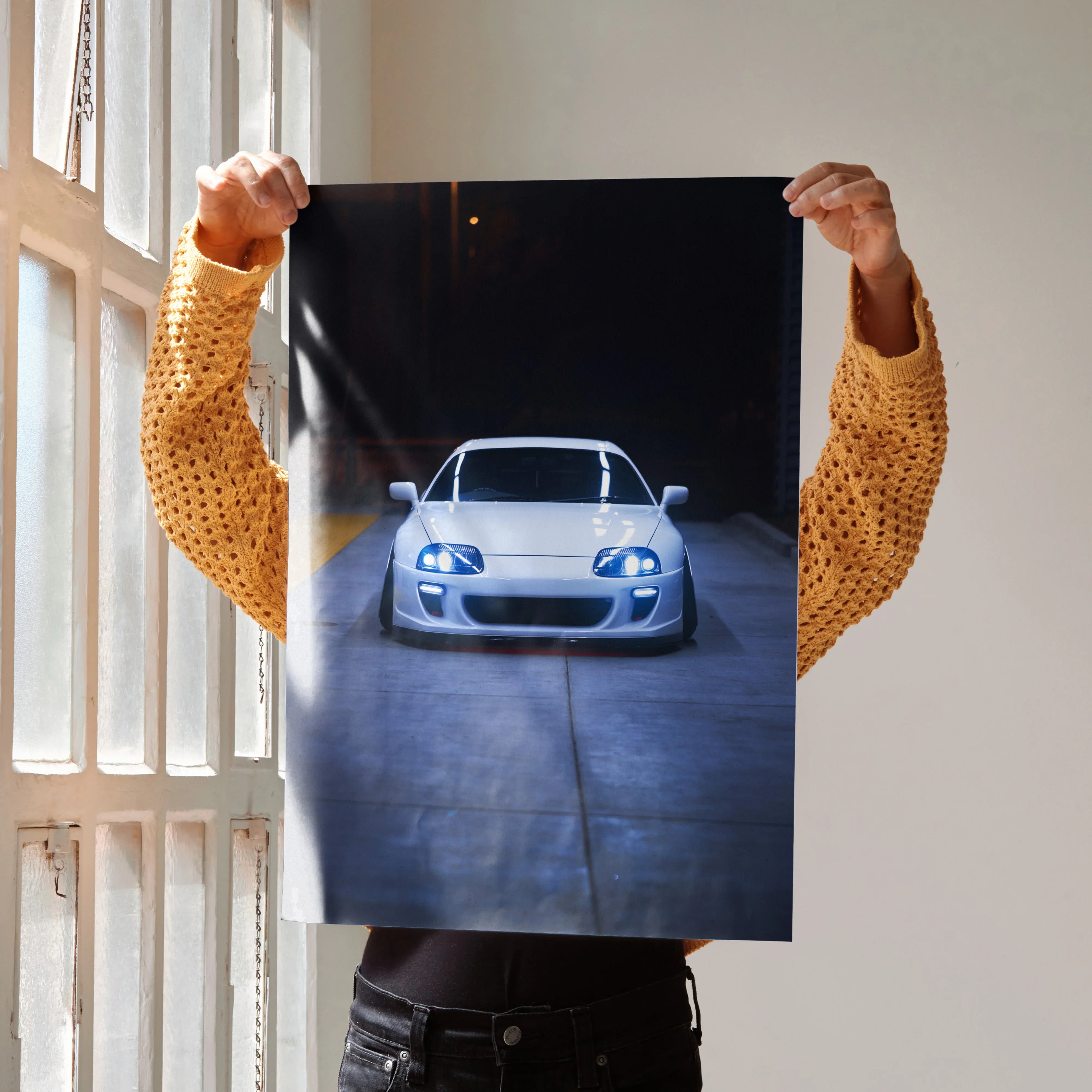 Toyota Supra MK4 front view poster with headlights on, displayed as wall art print.