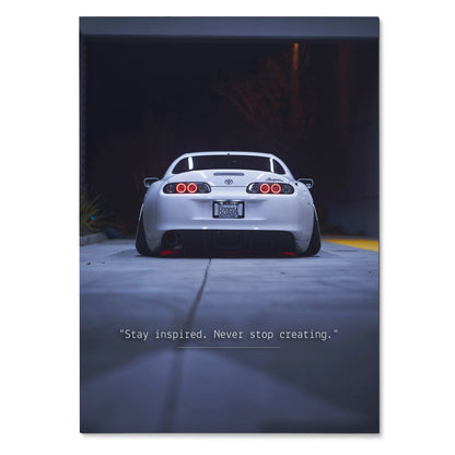 Toyota Supra Mk4 rear view at night with inspirational quote poster wall art.