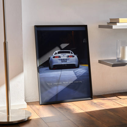 Motivational Toyota Supra Mk4 poster with inspiring text in black frame wall art.
