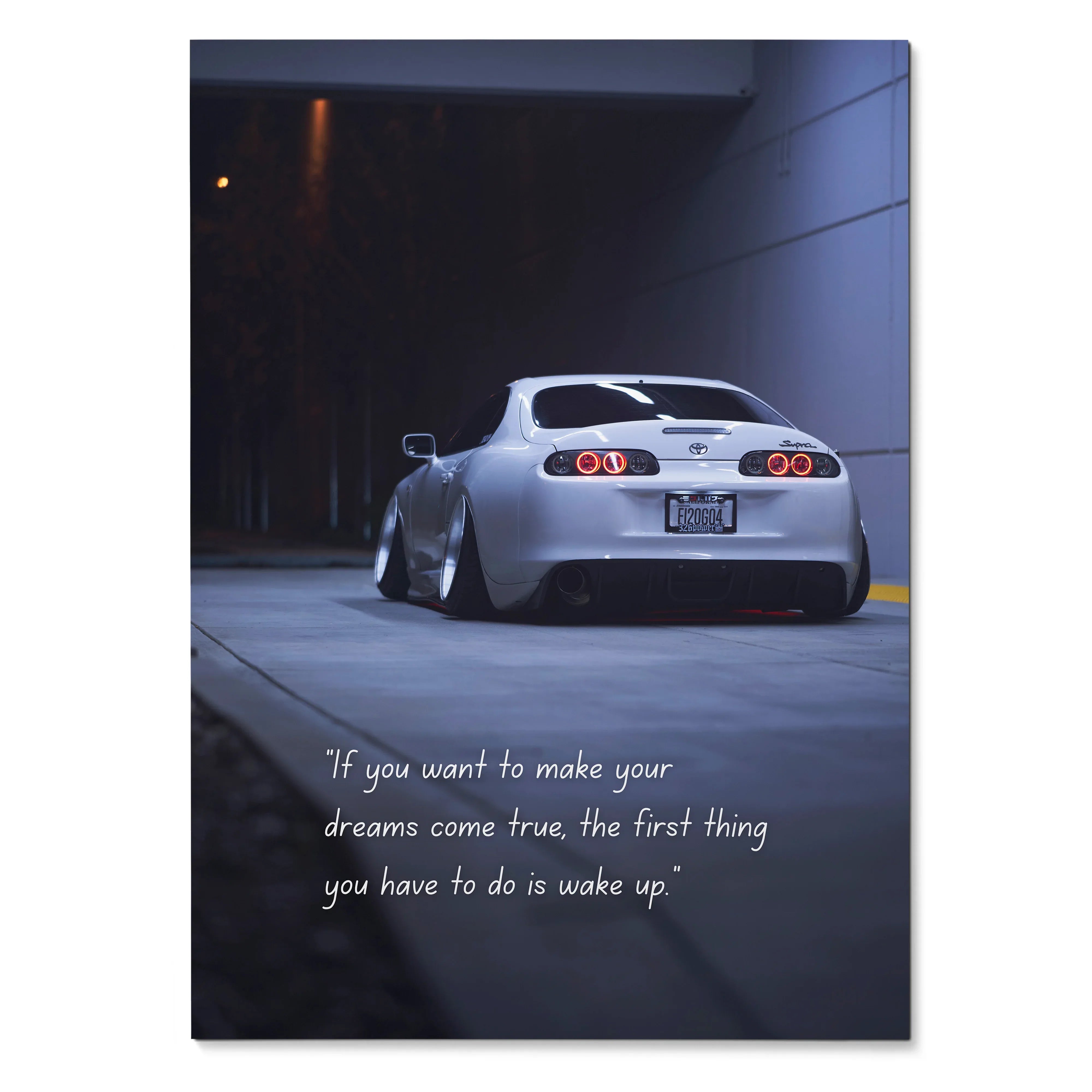 Toyota Supra Mk4 rear view poster with inspiring motivational text, wall art in dark urban setting.