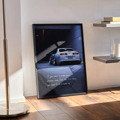 Toyota Supra Mk4 poster wall art with inspiring quote in dark garage setting.