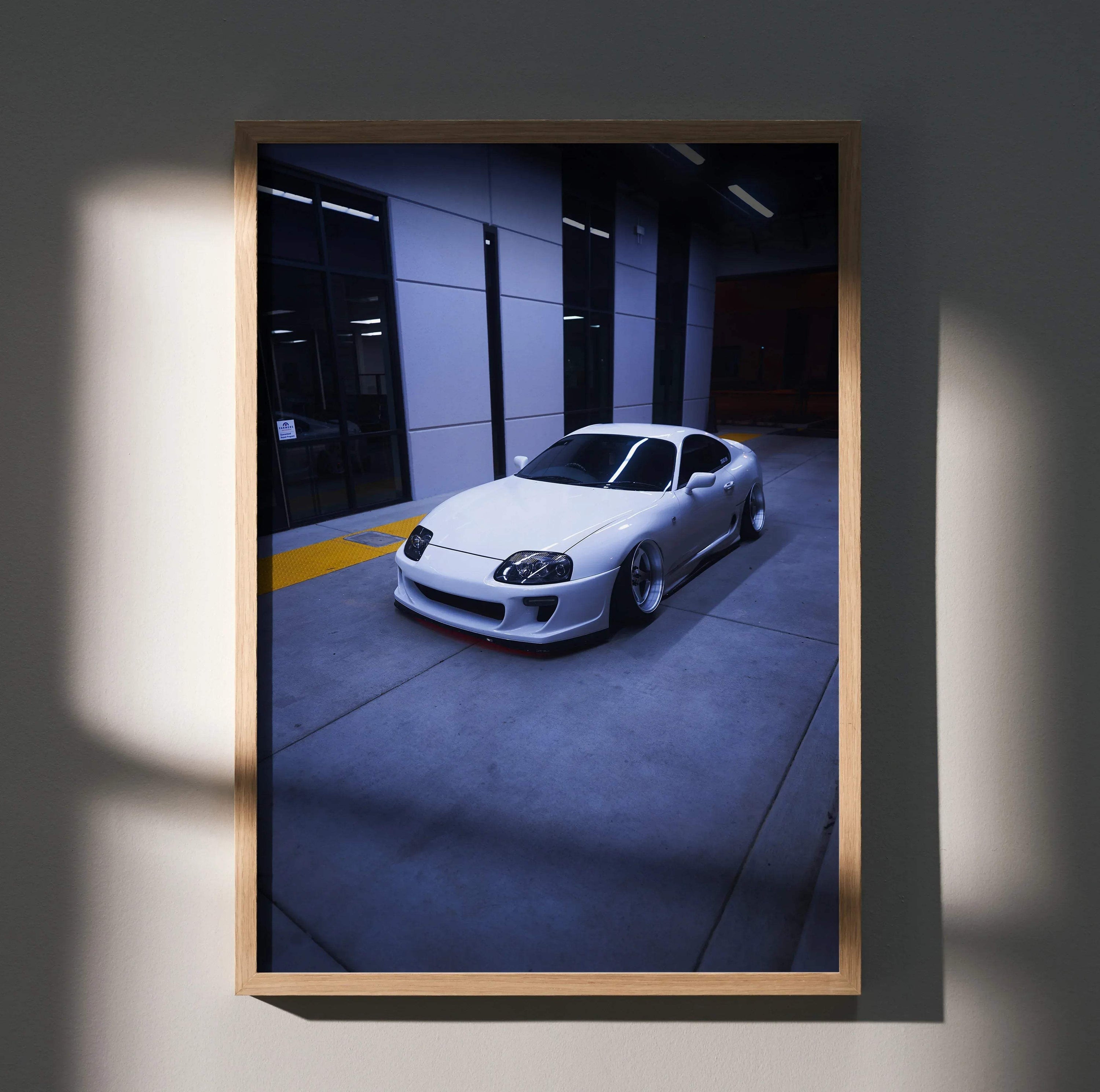 Toyota Supra MK4 silver sports car in dark modern garage poster wall art.