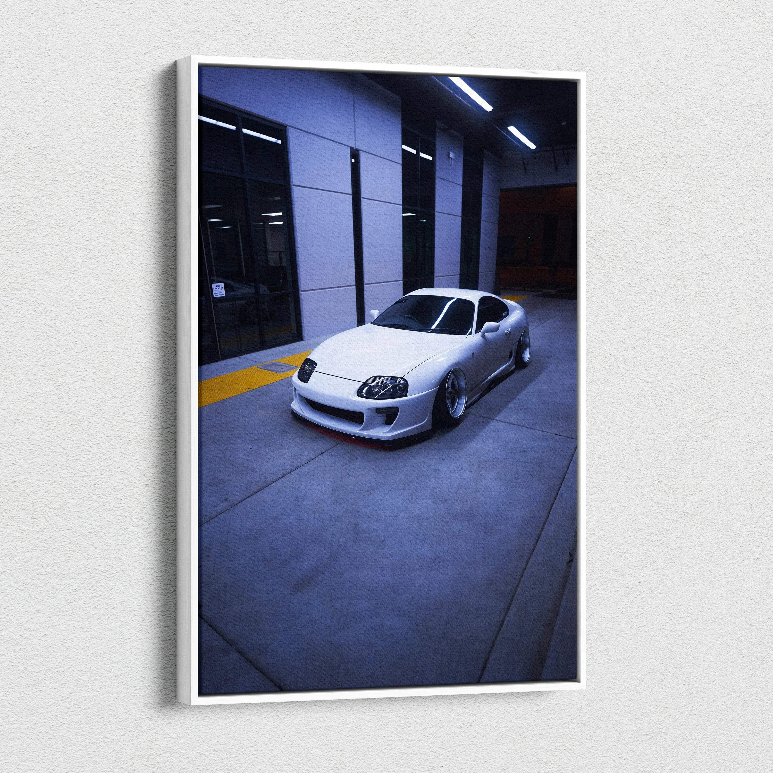 Toyota Supra MK4 sports car in sleek silver displayed on vertical canvas wall art with high-resolution detail.